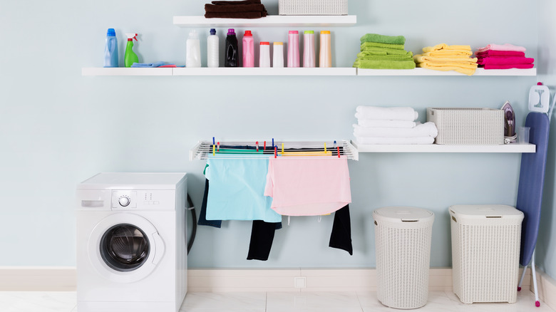 floating shelves in laundry room