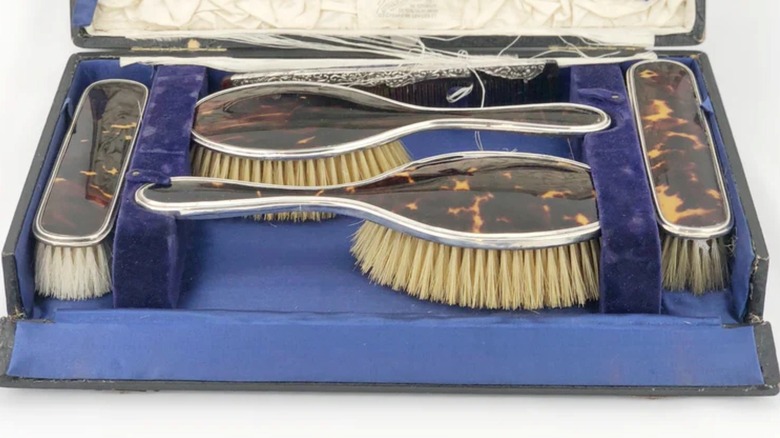 An antique toroise shell vanity set