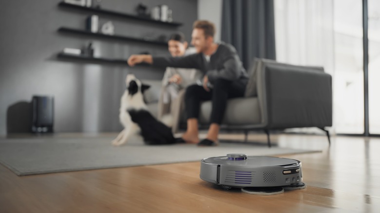 3i P10 Ultra robotic vacuum mopping floor in family home