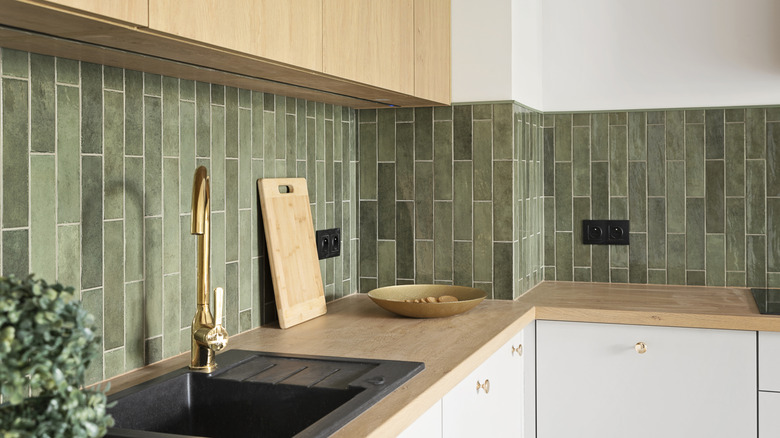Kitchen with tiled backsplash in avocado green