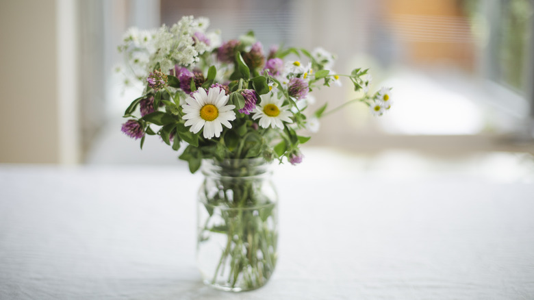 flowers in mason jar