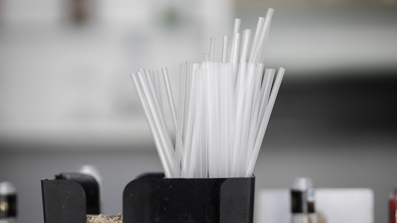 plastic straws in cup