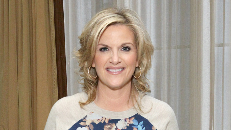 Woman using a microphone.