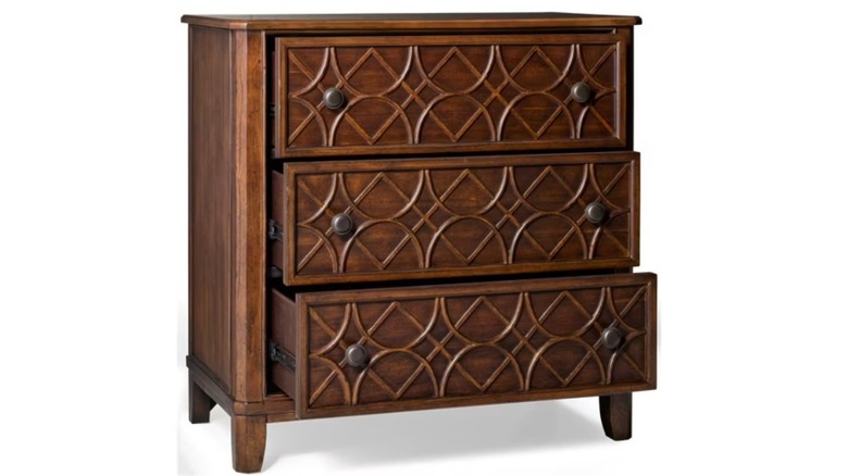 A chest with three drawers.
