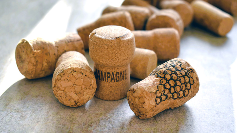 A collection of wine corks sitting on a countertop