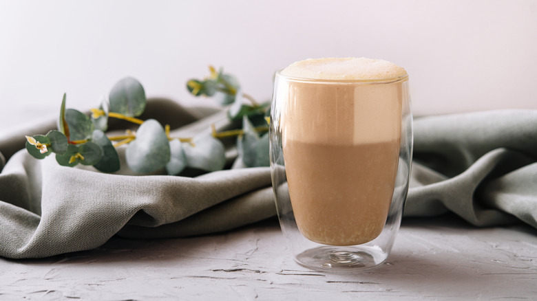 Double-walled mug full of coffee