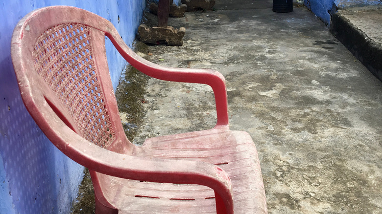 Faded patio red chair