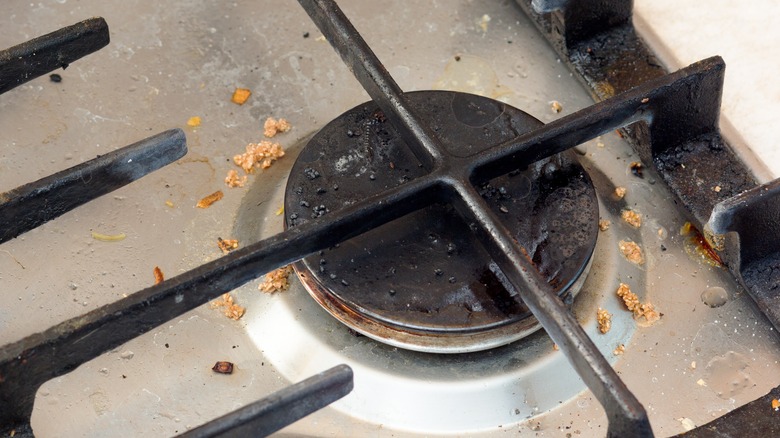 Dirty burner cap on stove