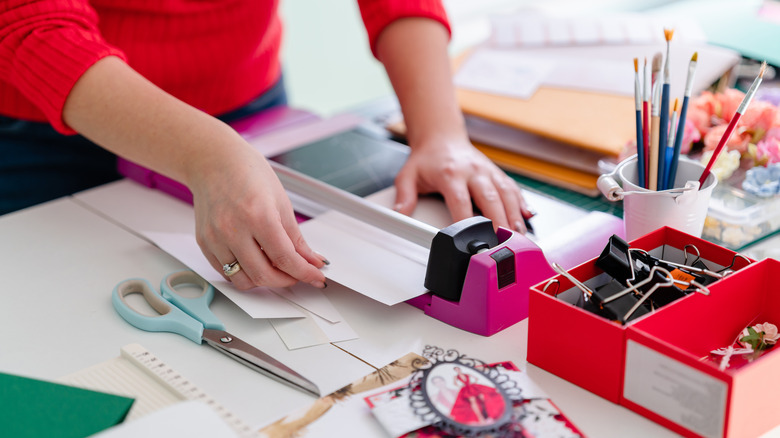 person crafting on table