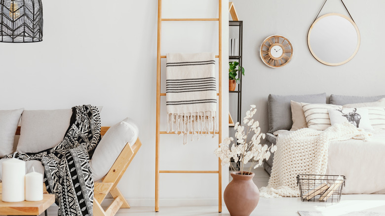 Room with blanket ladder