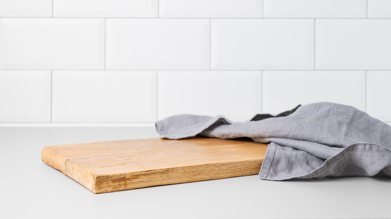 Cutting board sitting on counter