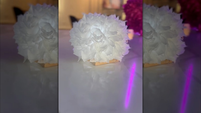 A table centerpiece covered in tissue paper