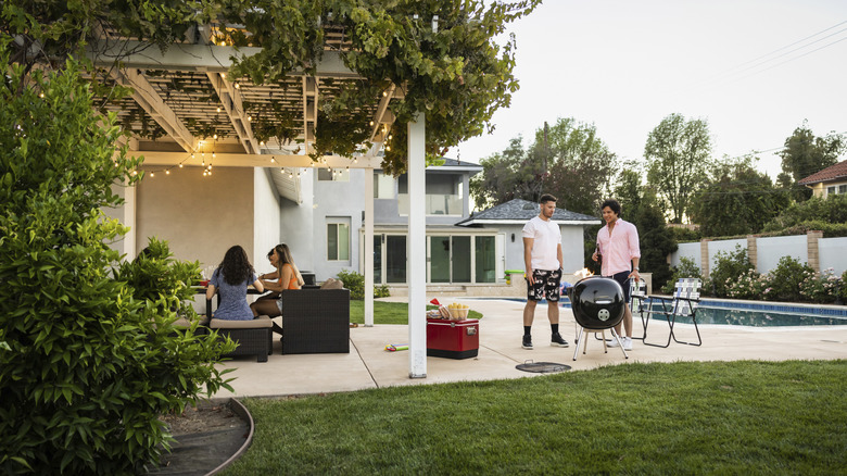 Group of people at a backyard cookout