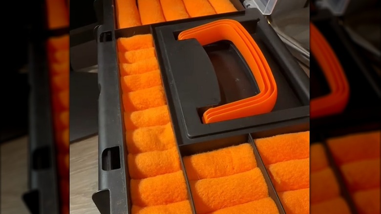 Dollar Tree toolbox jewelry case with orange felt