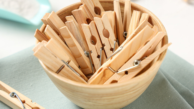 Bowl of wooden clothespins