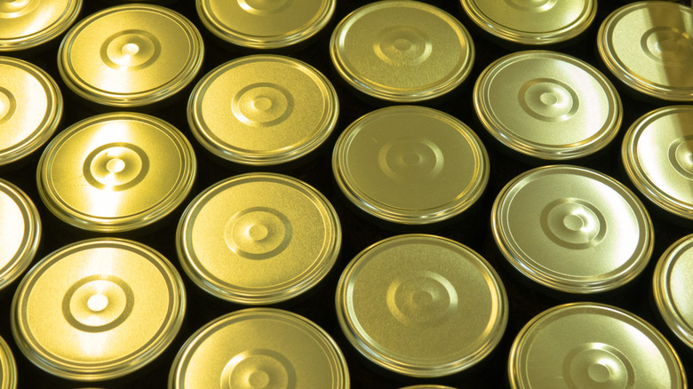 An overhead view of Mason jar lids.