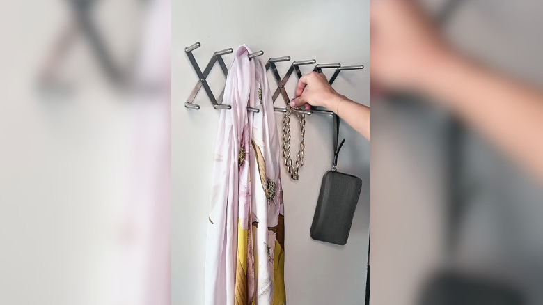 The IKEA VARIERA used as an entryway hanging rack