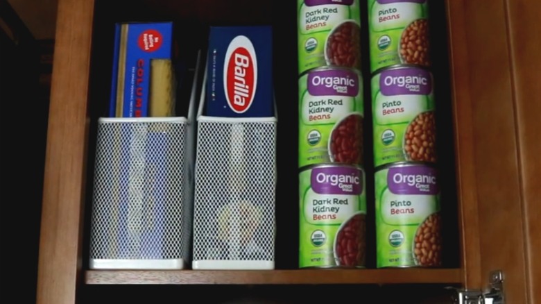 Pasta boxes in mesh magazine racks