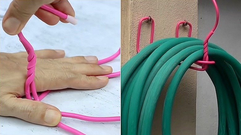 DIY hose organizer hanging on orange wall