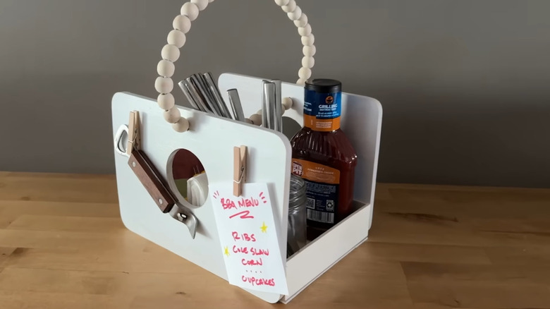 wooden storage basket made with Dollar Tree supplies filled with kitchen items
