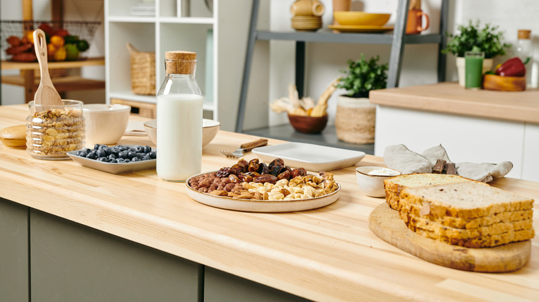Different vegetarian foods on a kitchen table