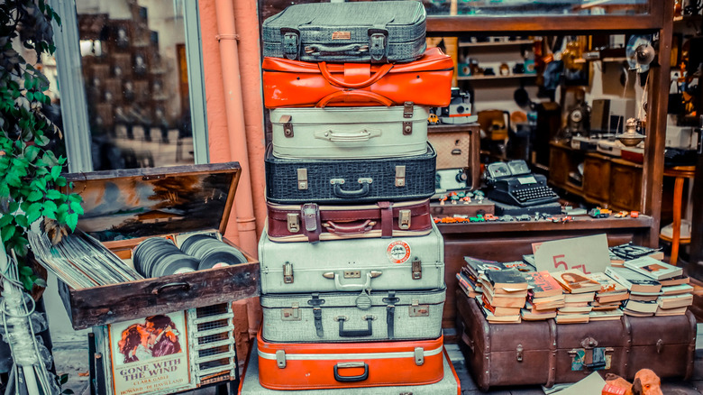 A pile of antique suitcases