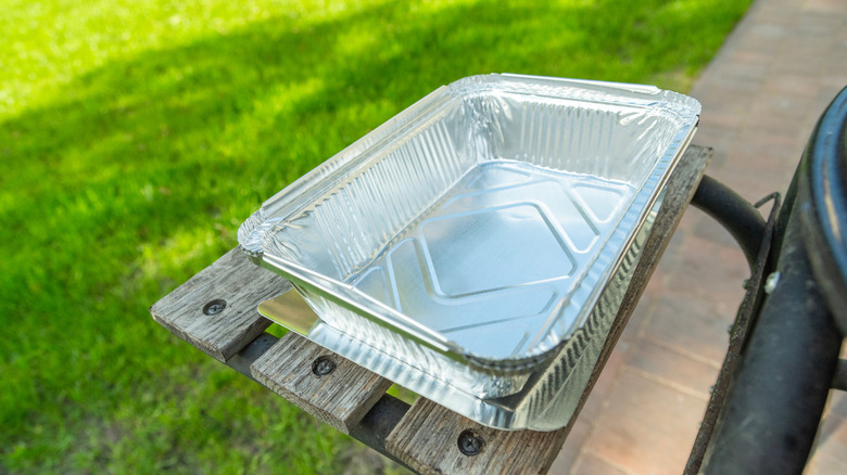 Empty baking tin on an outdoor table