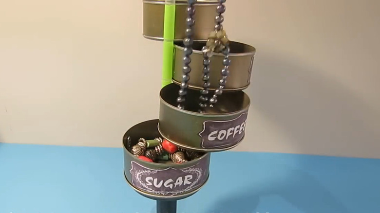 DIY jewelry holder made from tuna cans
