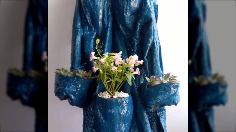 screenshot of a blue shirt-shaped planter