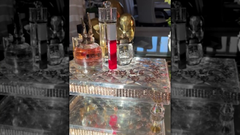 A candy-box-turned-perfume-display shelf