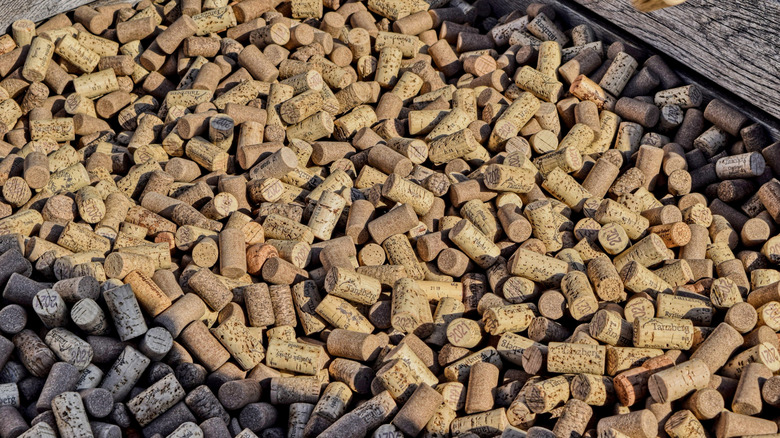 Assorted wine corks in container