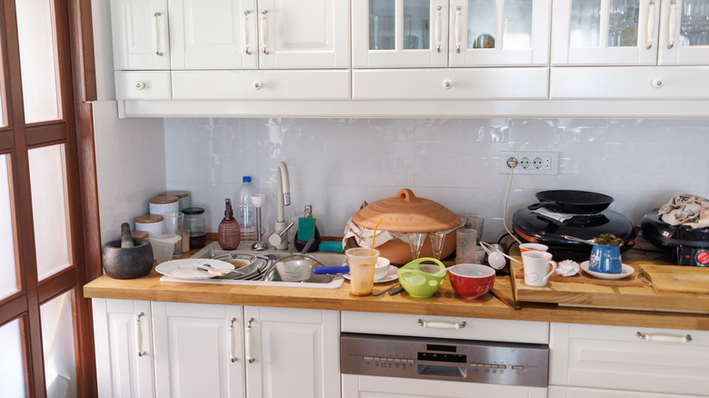 A messy kitchen counter