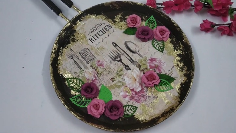Pan painted red with felt flowers and a bow