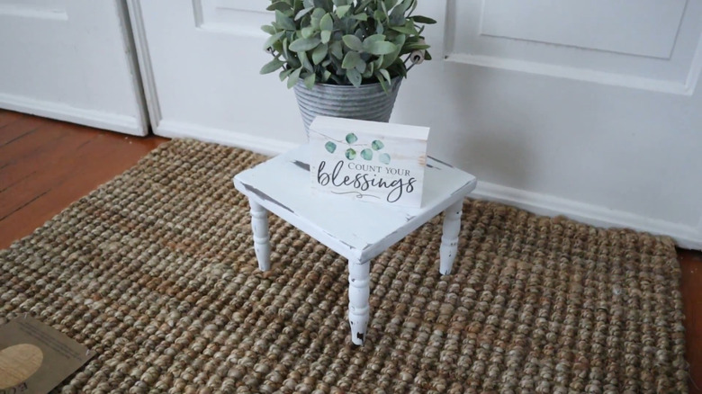 use old furniture legs and spindles to make a plant stand