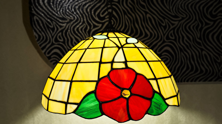 Vintage yellow glass lampshade with red flower