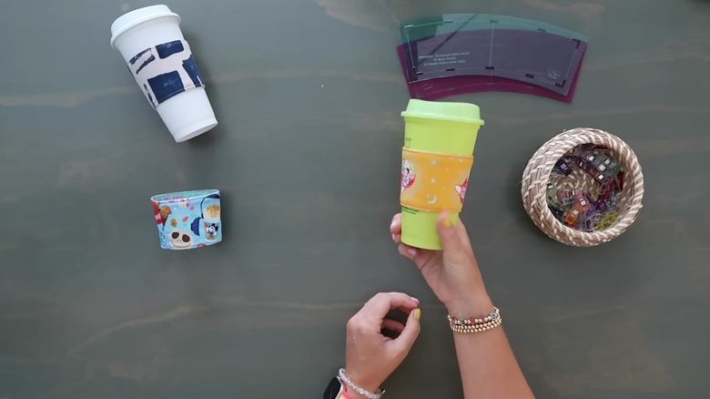 Reusable coffee mug with reversible fabric cozy