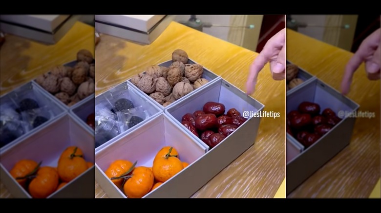 A shoe box with fruit in it