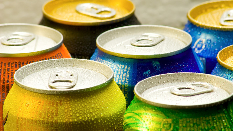 A variety of different soda cans