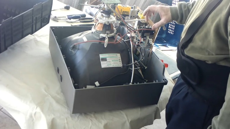 CRT TV with the back mount removed.