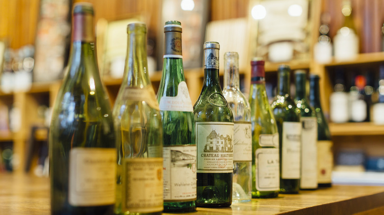 A row of empty wine bottles