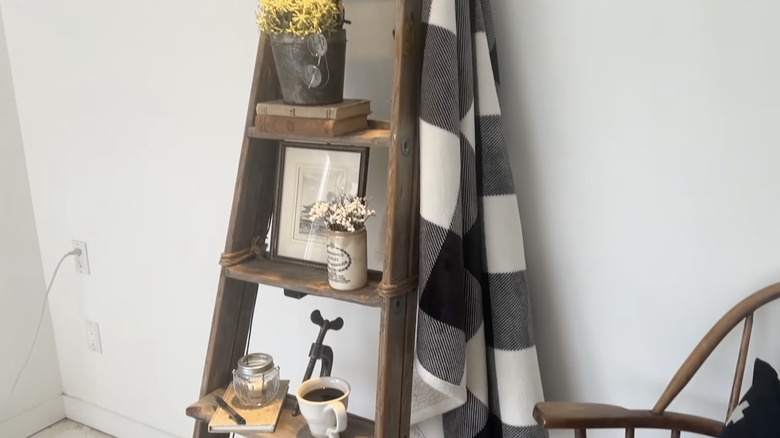 Flowers on ladder display shelves