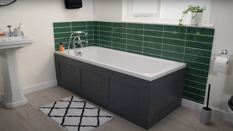 Bathtub with wooden panel covering