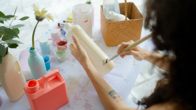 woman painting vase