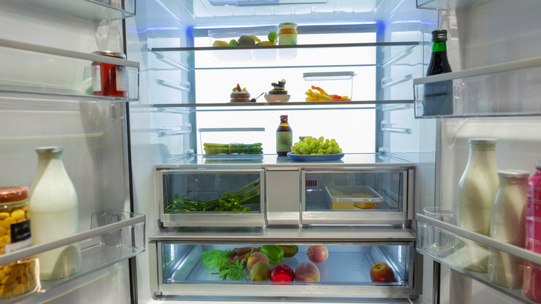 On open refrigerator is clean and tidy.