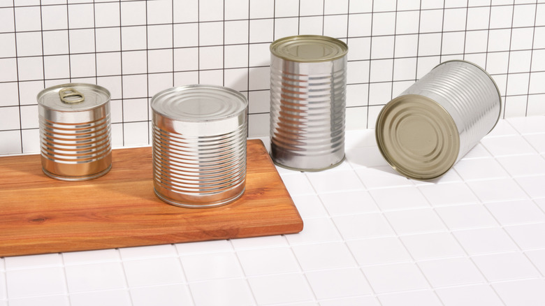 Tin cans on kitchen counter