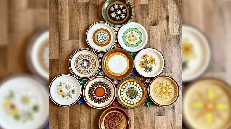 Plates arranged in the shape of a Christmas tree