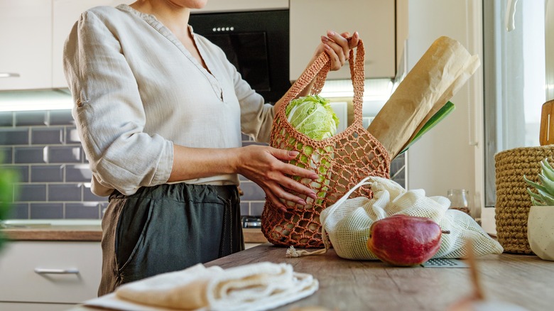 woman with mesh bag