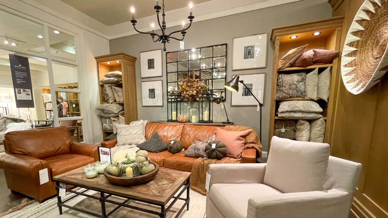 A living room display at Pottery Barn featuring leather couches.