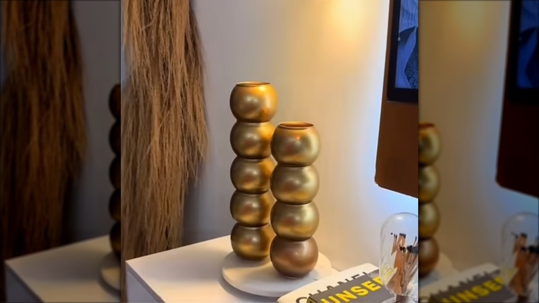 Elegant tall, gold vases created with Dollar Tree glass vases