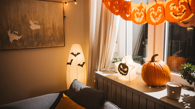 A living room is decorated for Halloween.